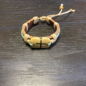 Adjustable leather cross cuff